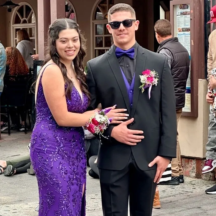 A man and woman posing for the camera.